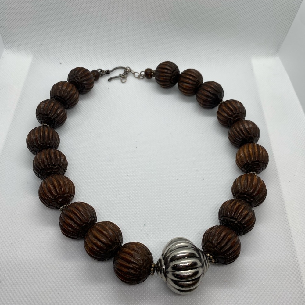 Ribbed Wooden Beaded Necklace with silver centerpiece
